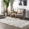NuLOOM Fleur Geometric High/Low Tassel Area Rug